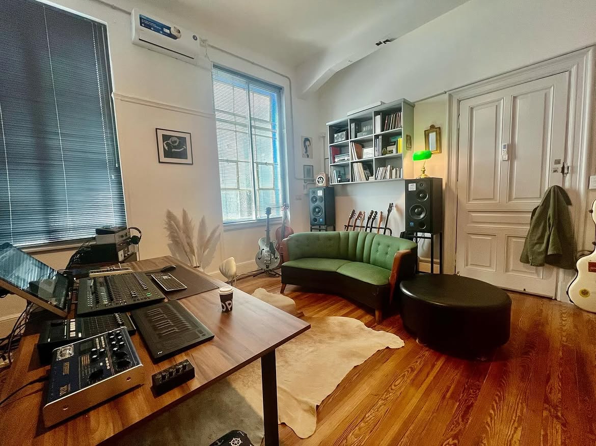 The listening end of the studio, with seating facing the speakers